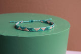 LOOM armbånd - 3 rækker (trekanter - støvet grøn, blå, rosa)